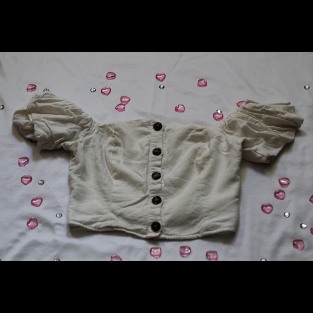 off the should button up.